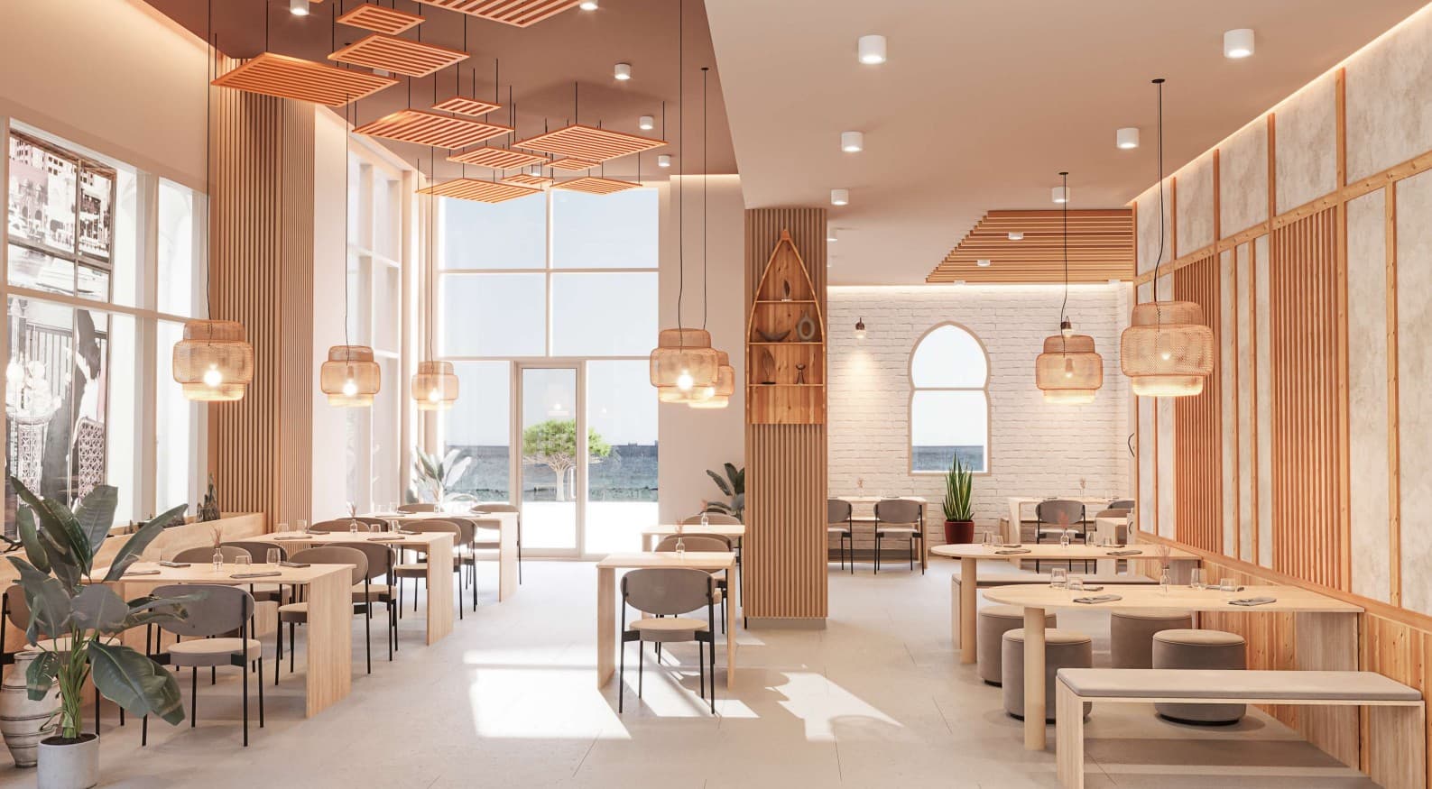Interior dining room at Jeju Snow Salmon — light wood tables and shared seating under woven pendant lights.